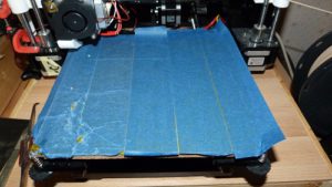 adding blue painters tape over the top